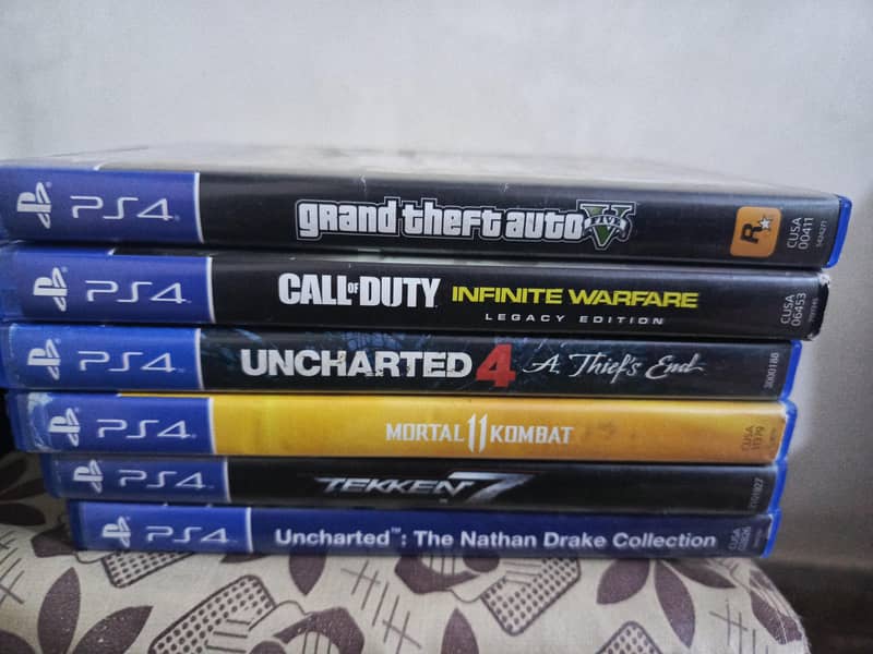 ps4 pro with games  with two controller 1