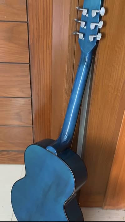 Beautiful blue guitar with bag for sale