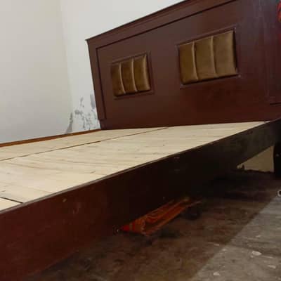 Double wood bed . condition like new . 03211133458