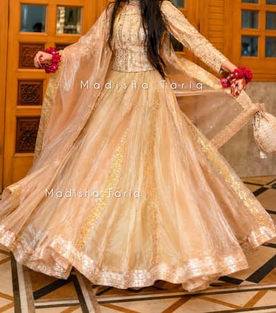 Designer Golden Lehnga Choli with Matching Potli Bag - Urgent Sale!