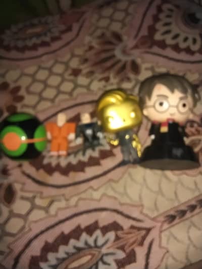 Harry Potter and Pokemon ball Or pop toy and roblox player