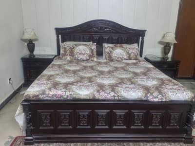 Bed with side tables