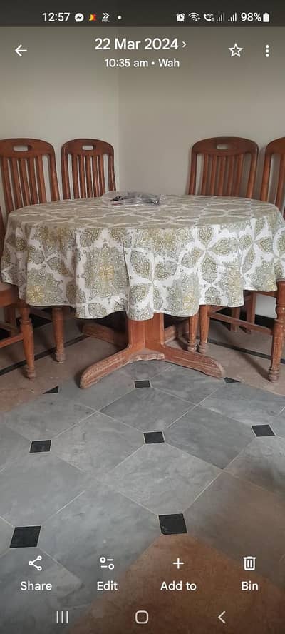 wooden round dining table