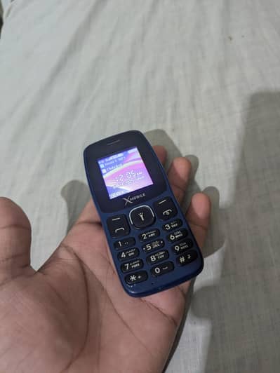 X Mobile Button Phone for Sale