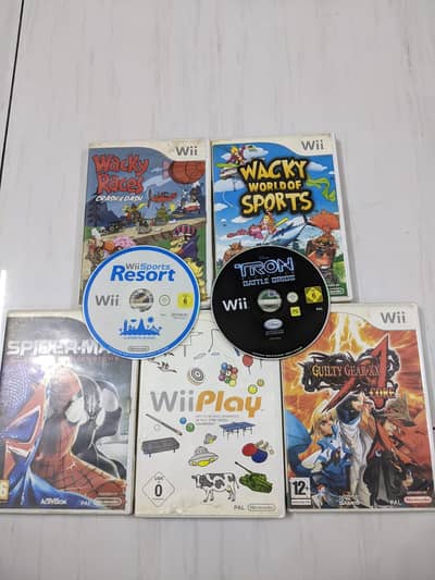 Nintendo Wii Complete Bundle – 2 Remotes, 2 Nunchuks, 2 Whee