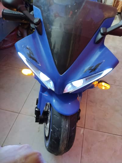 Kid chargeable bike for more details Contact me 03181006127