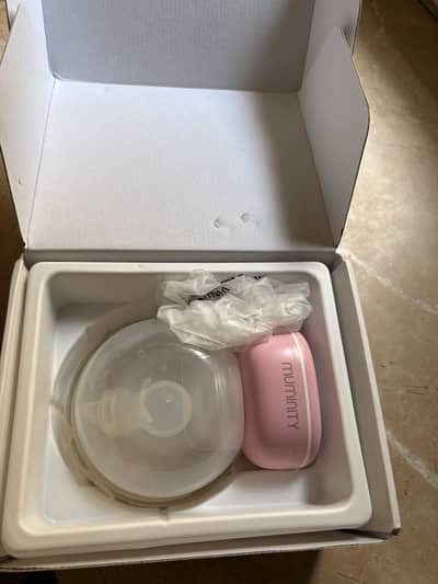 Wearable breast pump muminity solo flow