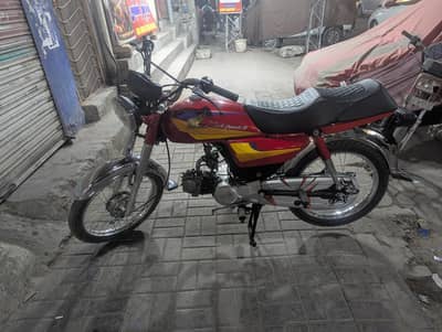 dhoom bike ha 2005 model ma ready ha what's up no 03224635171