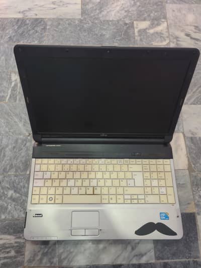 Fujitsu Lap top 1st generation With Charger