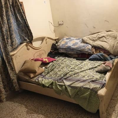 Used  intereood king bed + dressing table and two side tablle for sell