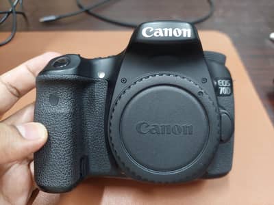 Canon 70D body only + Benro backpack