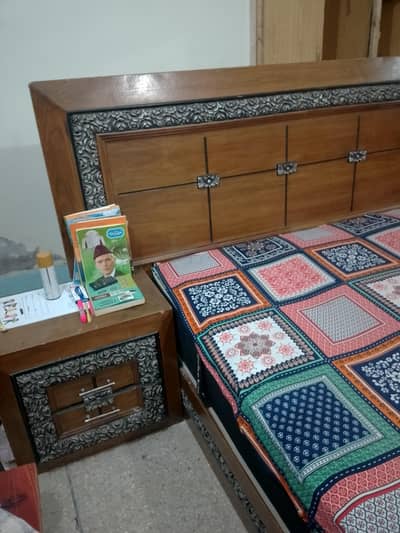 Wooden Double Bed in new condition lightly used, without mattress