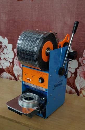 Cup sealer machine with 1 duy and 1 roll free