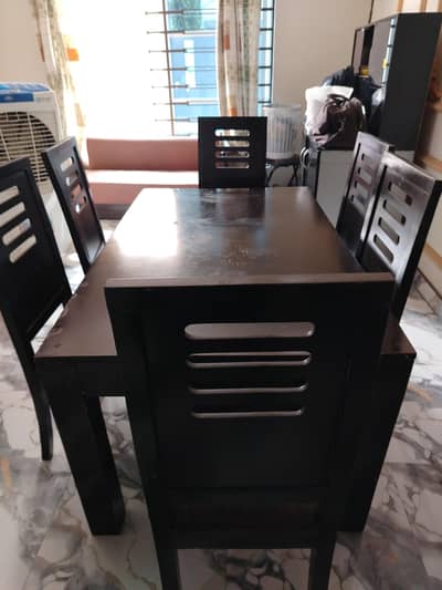 wooden dining table with 6 chairs