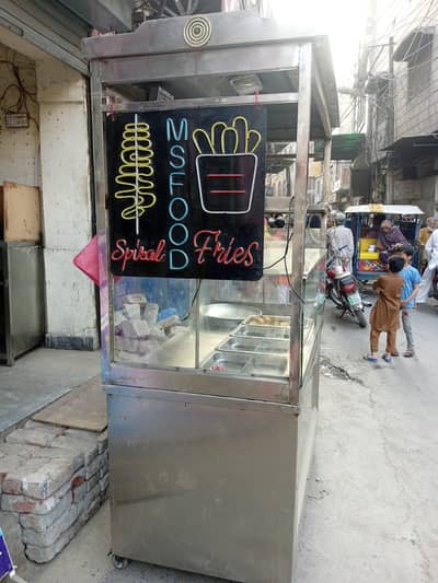 Food counter + fryer + refrigerator + cylinders