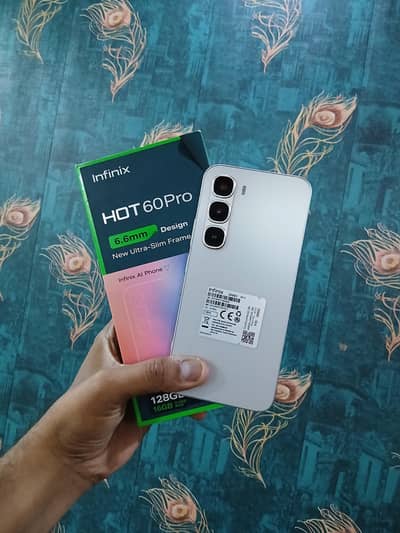 infinix Hot 60 pro 8Gb 128gb (7 month war ) complte box 10/10 Conditin