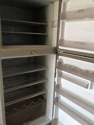 Dawlance fridge full size in neat and clean condition