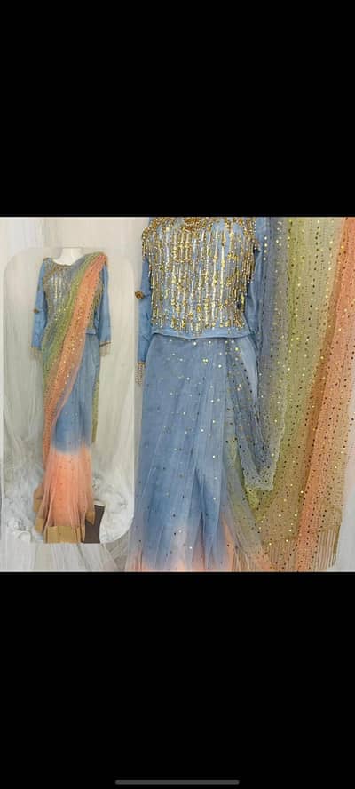 Makesh saaree of pastel peach green and blue  colors with a blouse of