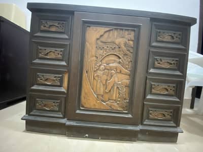 Antique wooden table with drawers and built in chair
