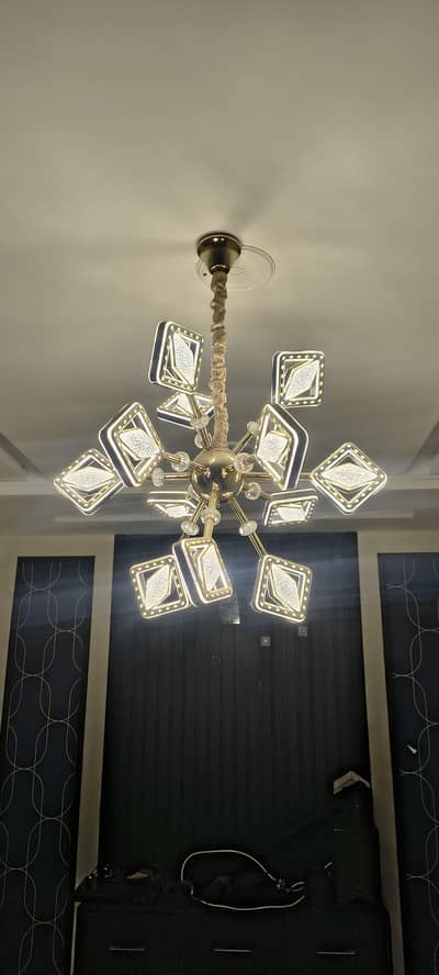 This modern gold SMD chandelier for sale