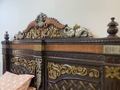 wooden bed with dresser and side tables