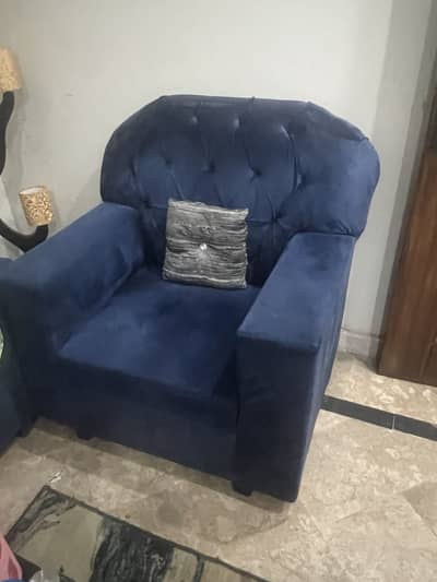 Sofa set with seater, center table, rug and curtains