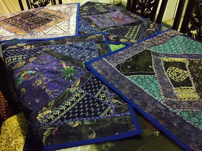 Cushion covers large and small, table runners