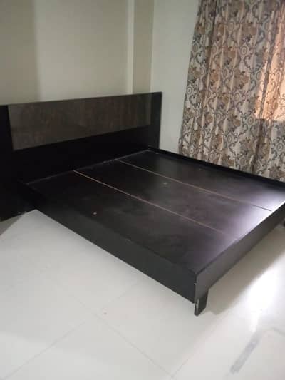 Wooden double bed for sale