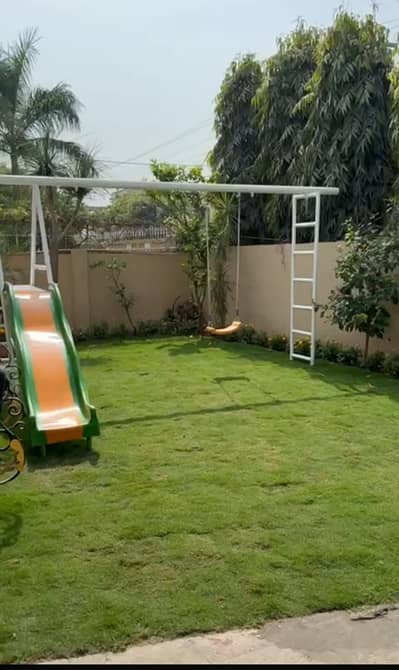 1 Kanal + 460 Sqft Elegant Single Storey House for Sale in DHA Phase 4 FF Spacious Living with Beautiful Lush Lawn