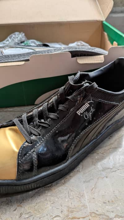 Puma Clyde Wraith Sneakers – Black & Gold 