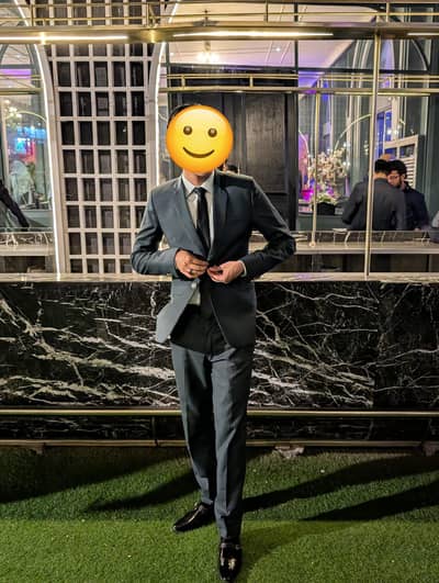 stylish Bottle green complete suit available in 2 sizes