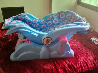 mama love brand movable carry cot.