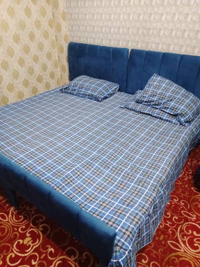Two Single Wooden Bed with blue Poshish
