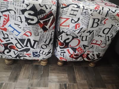 Pair of Elegant Typography Printed Ottoman Stools