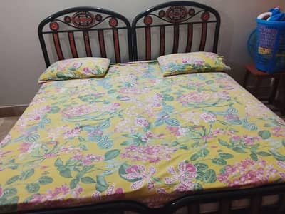 iron 2 single bed without matress for sale
