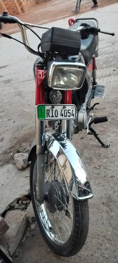 12modal honda 70 pindi numbers orignal tanki. tappy nahi ha