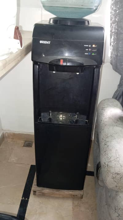 despenser in good  condition  with refrigerator