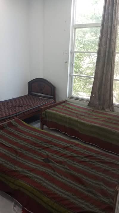 BINACA GIRLS HOSTEL COMMERCIAL MARKET RAWALPINDI