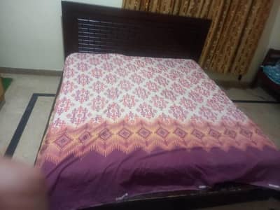 King size bed with side tables along with mattress