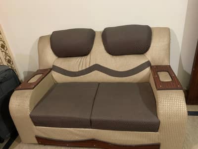 beige and brown sofa set