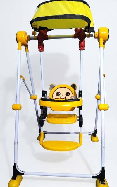 Baby swing with safety harness