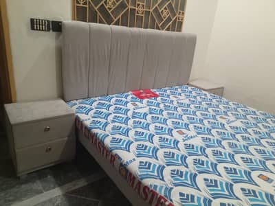 Double bed with side tables and mattress