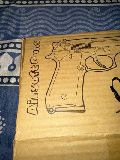 Toy gun in real gun