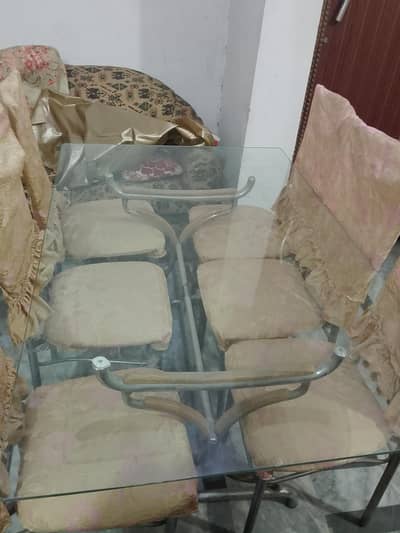 glass dining table with 6 chairs
