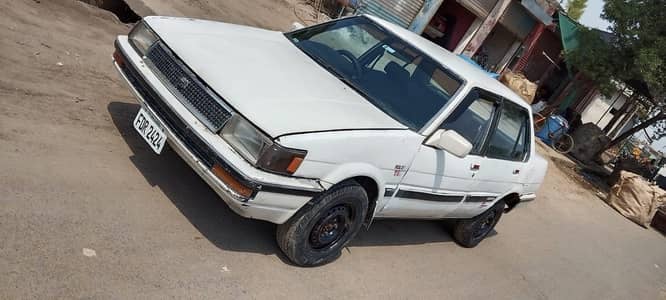 Toyota Corolla 1986 ac k Saman lga he