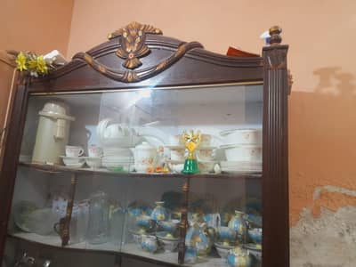 wooden showcase with glass door