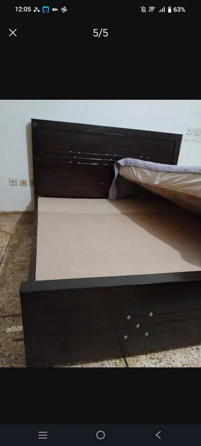 wooden brown bed