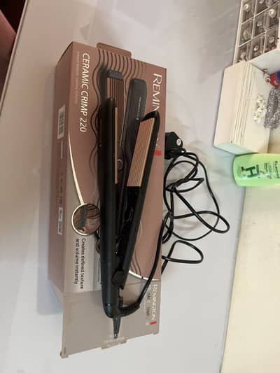 Regminton creamic crimp 220 hair straightener.