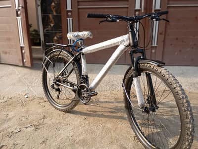 caspian bycycle with shimano gears dual disk break and front suspentio