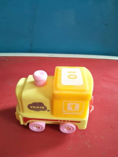 Pull along toy locomotive